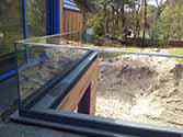 Terrass, stolpfritt glasräcke med överliggare i rostfritt stål